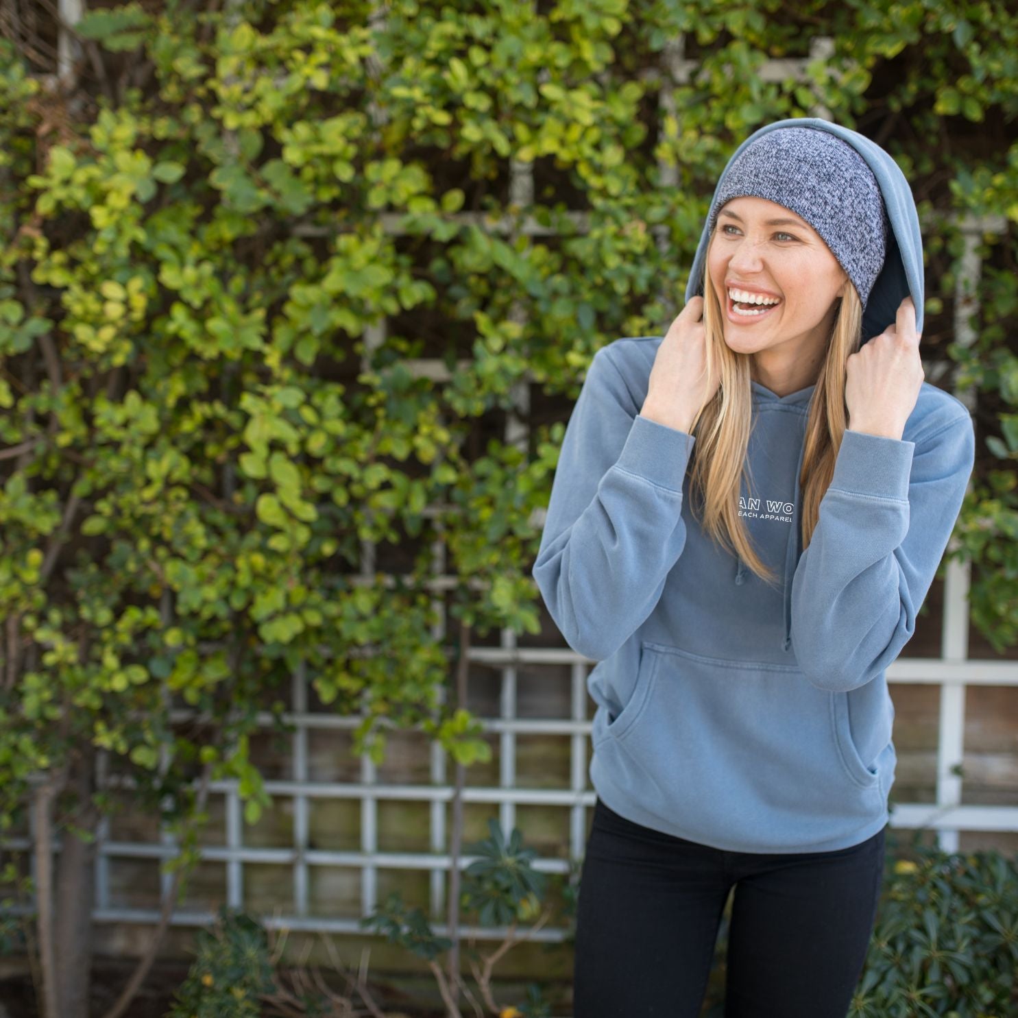 woman wearing coastal sweatshirt