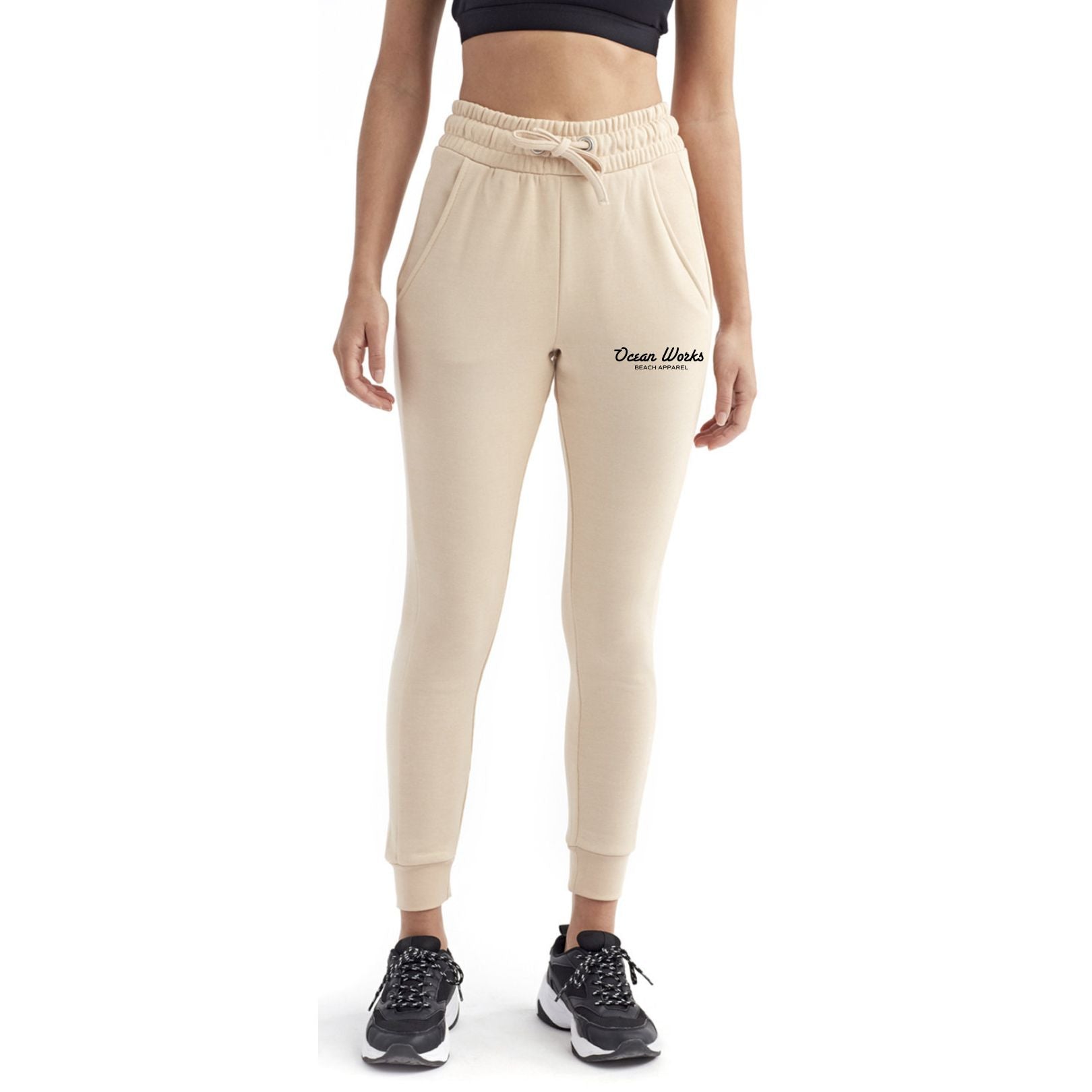 joggers with a logo on the left leg